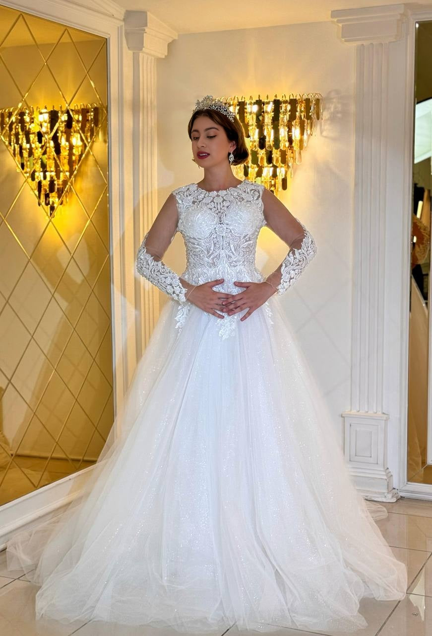 Romantic wedding dress "Stella" with long-sleeved lace bodice and glittering tulle skirt